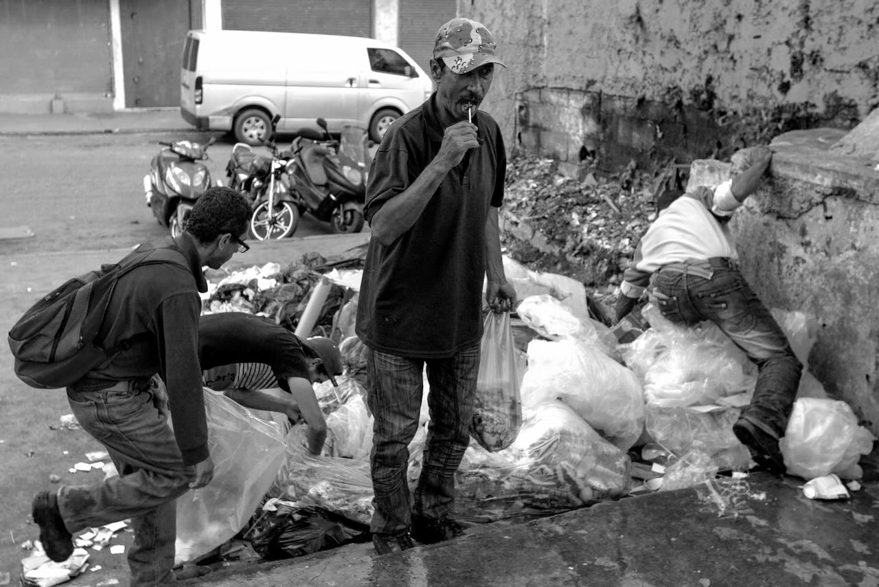 People eating from garbage in Venezuela